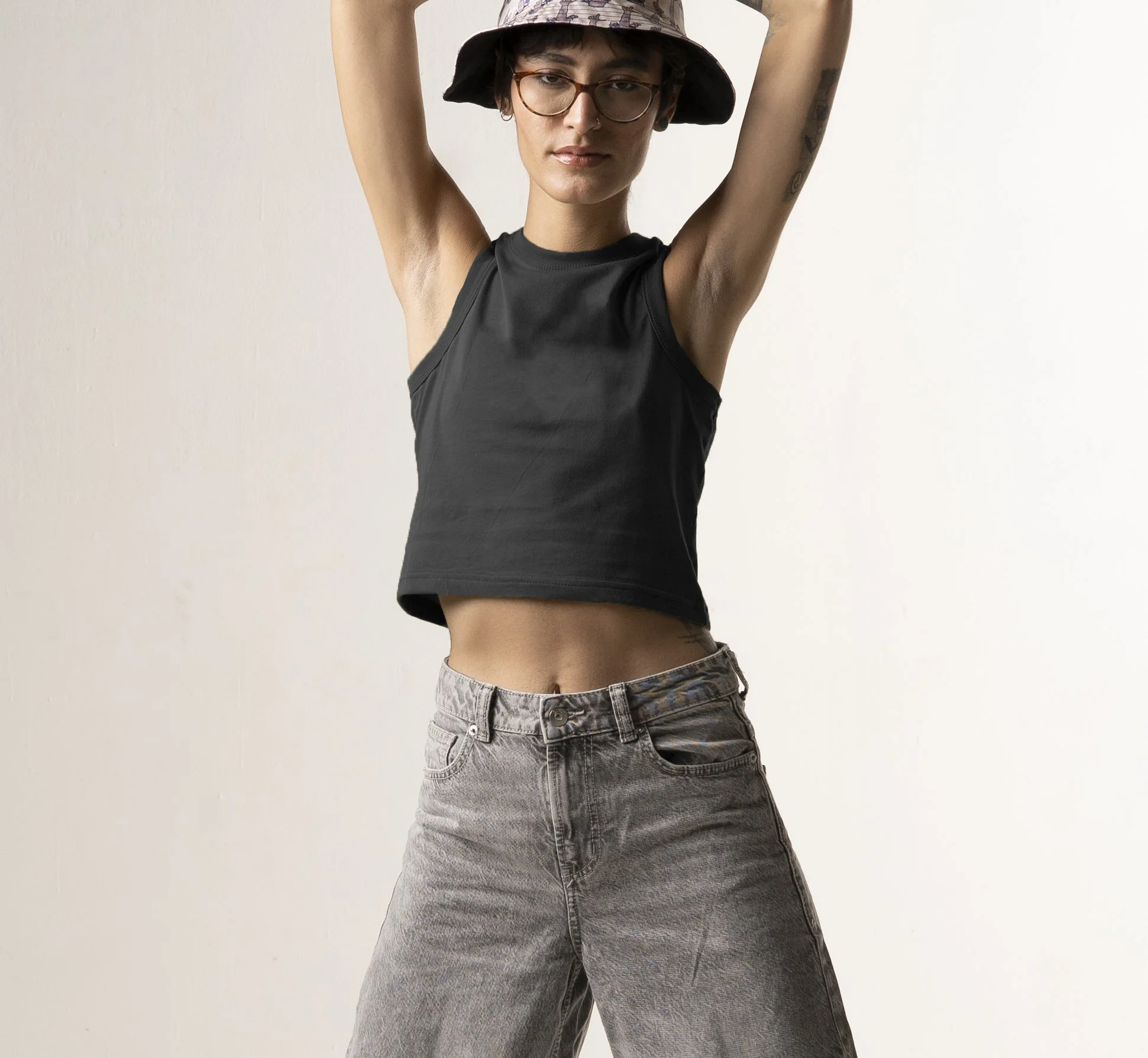 Clean  Tee Factory Women's crop tank in the color black in a cotton modal blend.