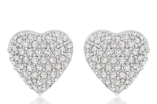 Pair of heart-shaped earrings encrusted with small, sparkling diamonds