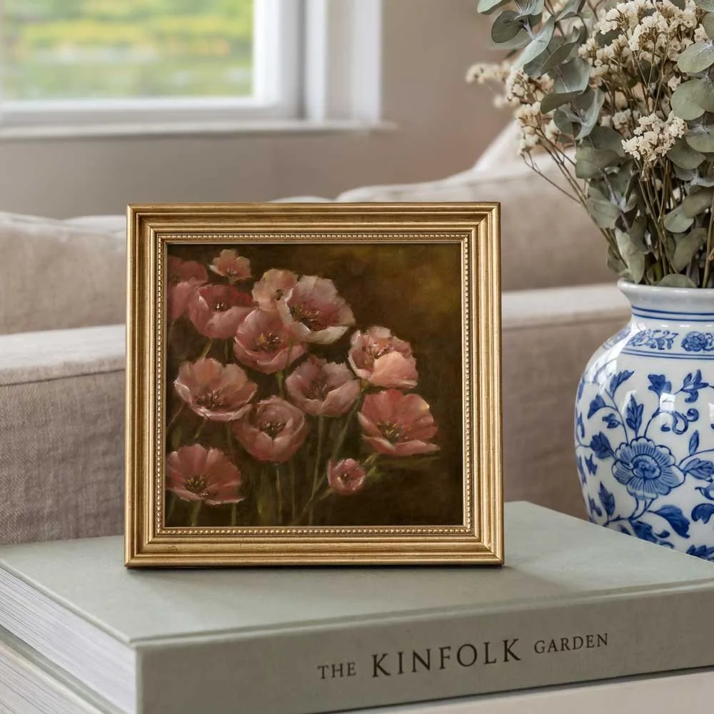 poppy-bloom-on-books.jpg