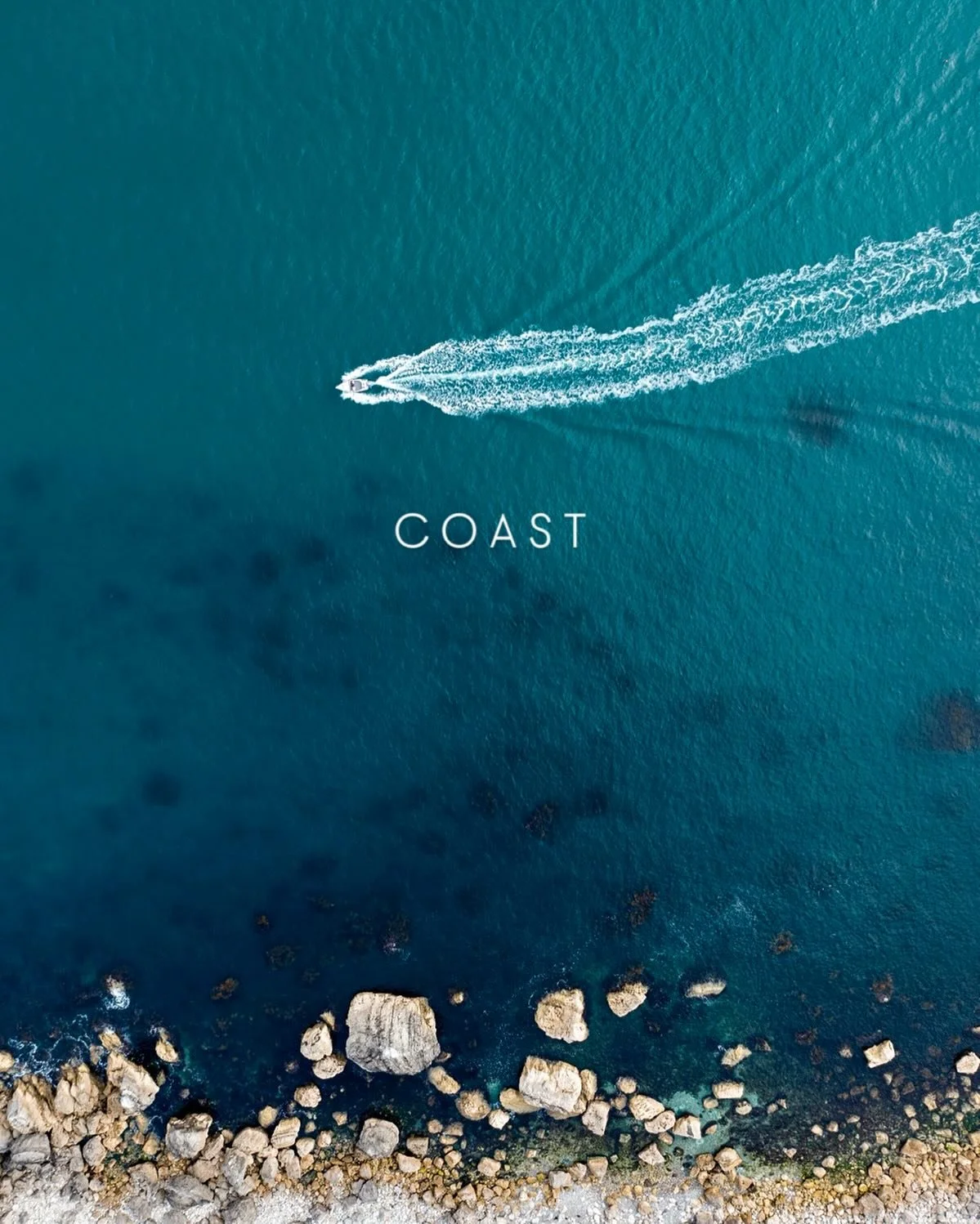 C O A S T 

Where cliffs lean into endless skies,
and gulls wheel high on salt-kissed air,
the ocean breathes in silver sighs,
a restless hymn, forever there.

The moors fall down to hidden bays,
where rock pools catch the fading sun,
and time dissol