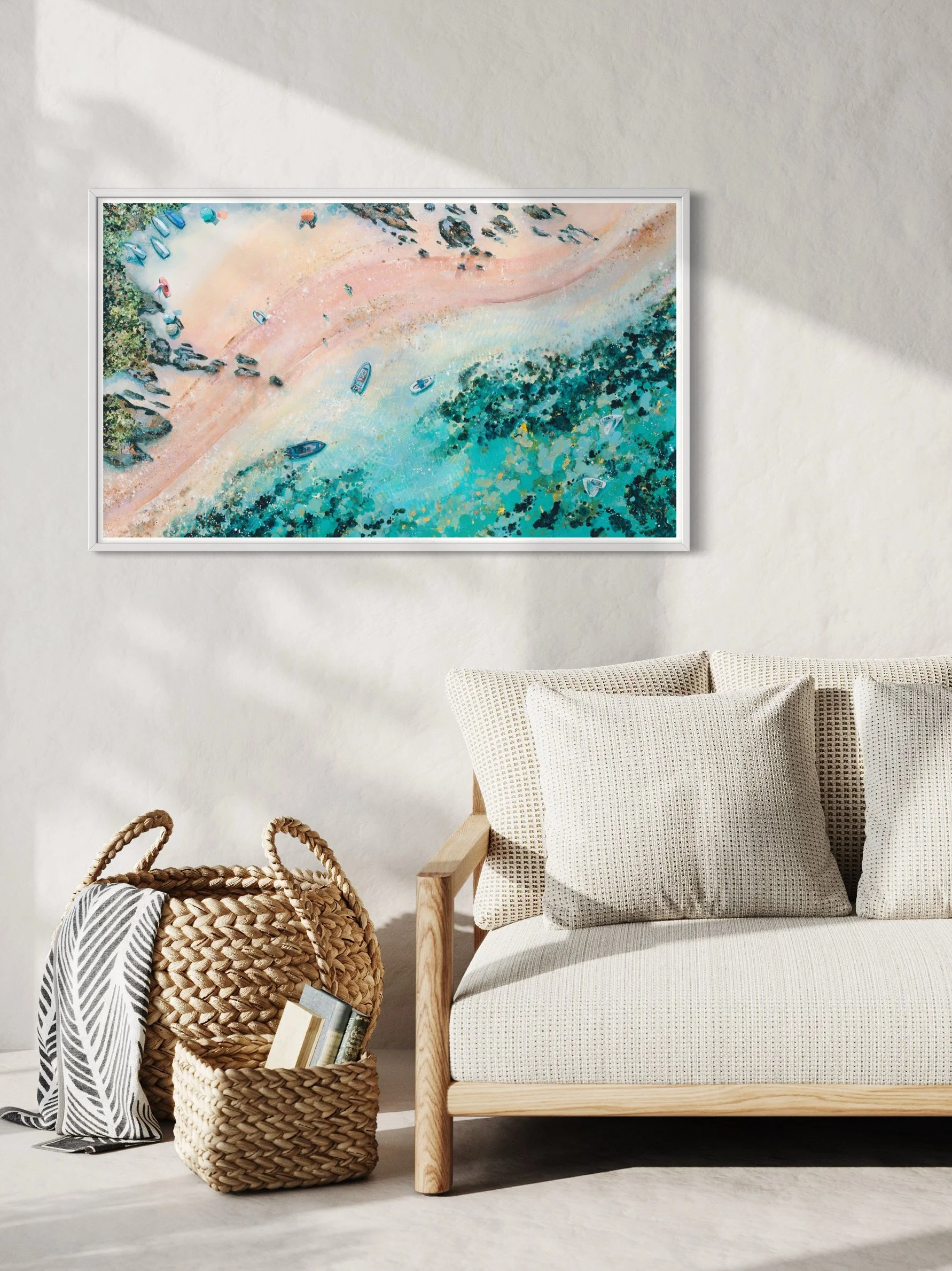The Mill Bay Manoeuvres print framed in a bright, coastal lounge, capturing the summer energy of South Devon