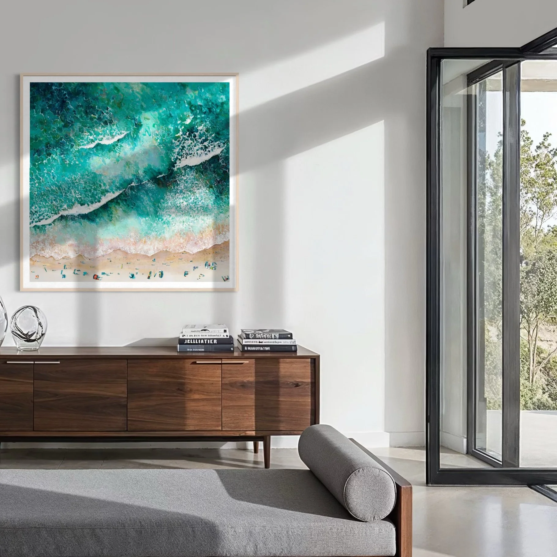 Large-scale Porthmeor Magic art print framed above a contemporary sofa, showcasing Cornish coastal decor and St Ives surf art.