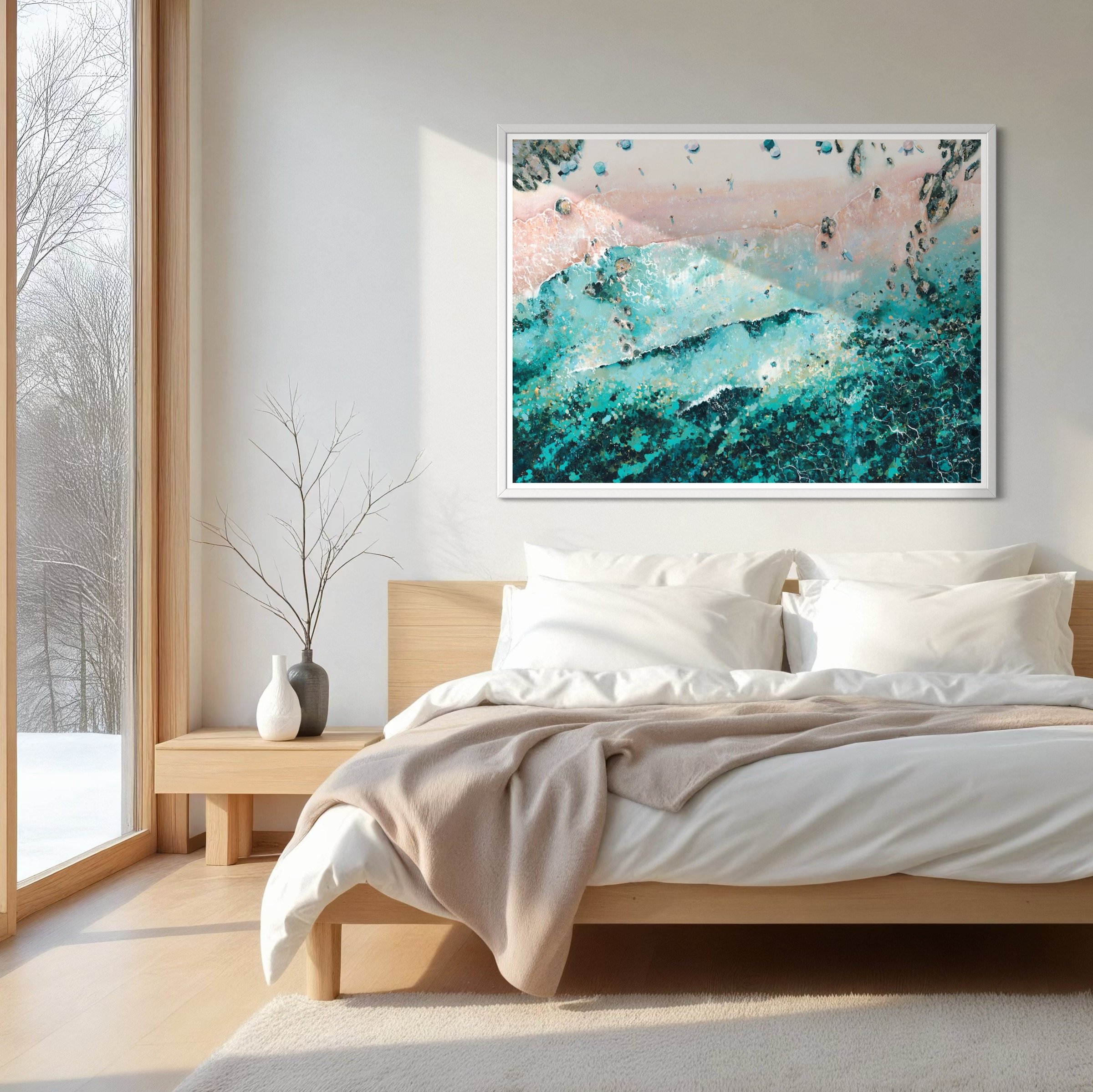 a large framed Wild Wonders print of Gara Rock beach styled in a modern British coastal home with natural textures.
