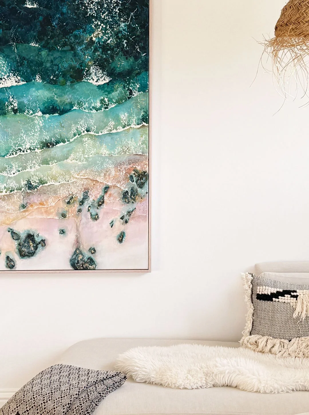 Large original acrylic painting 'Graceful Gwithian' by Lucy Young. Features dark blue rolling surf, coastal rocks, and a surf school on Gwithian Beach, st ives bay, Cornwall.