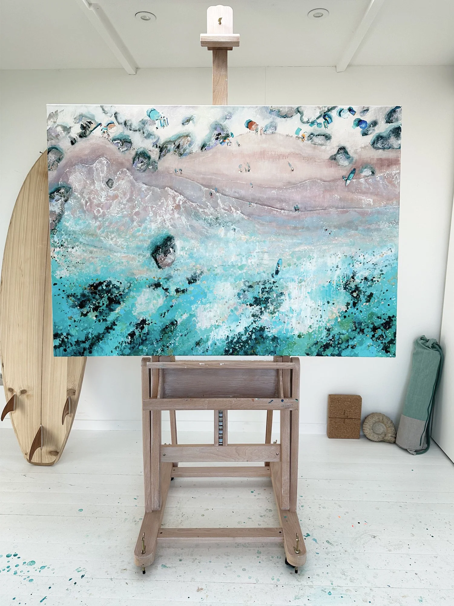 Large original aerial acrylic painting 'Mattiscombe Sands' by Lucy Young. A pastel-toned South Devon beach scene with a sweeping tide line, rocks, and clear water.