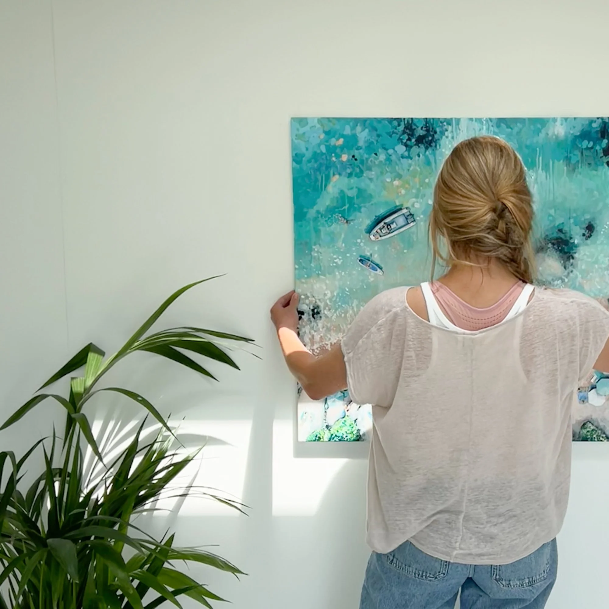 Explore "Perfect Day," an original acrylic painting of Sunny Cove, Salcombe by Lucy Young. A vibrant aerial study of sun-worshippers, turquoise waters, and boats on the East Portlemouth shoreline. A contemporary statement piece for coastal interiors.