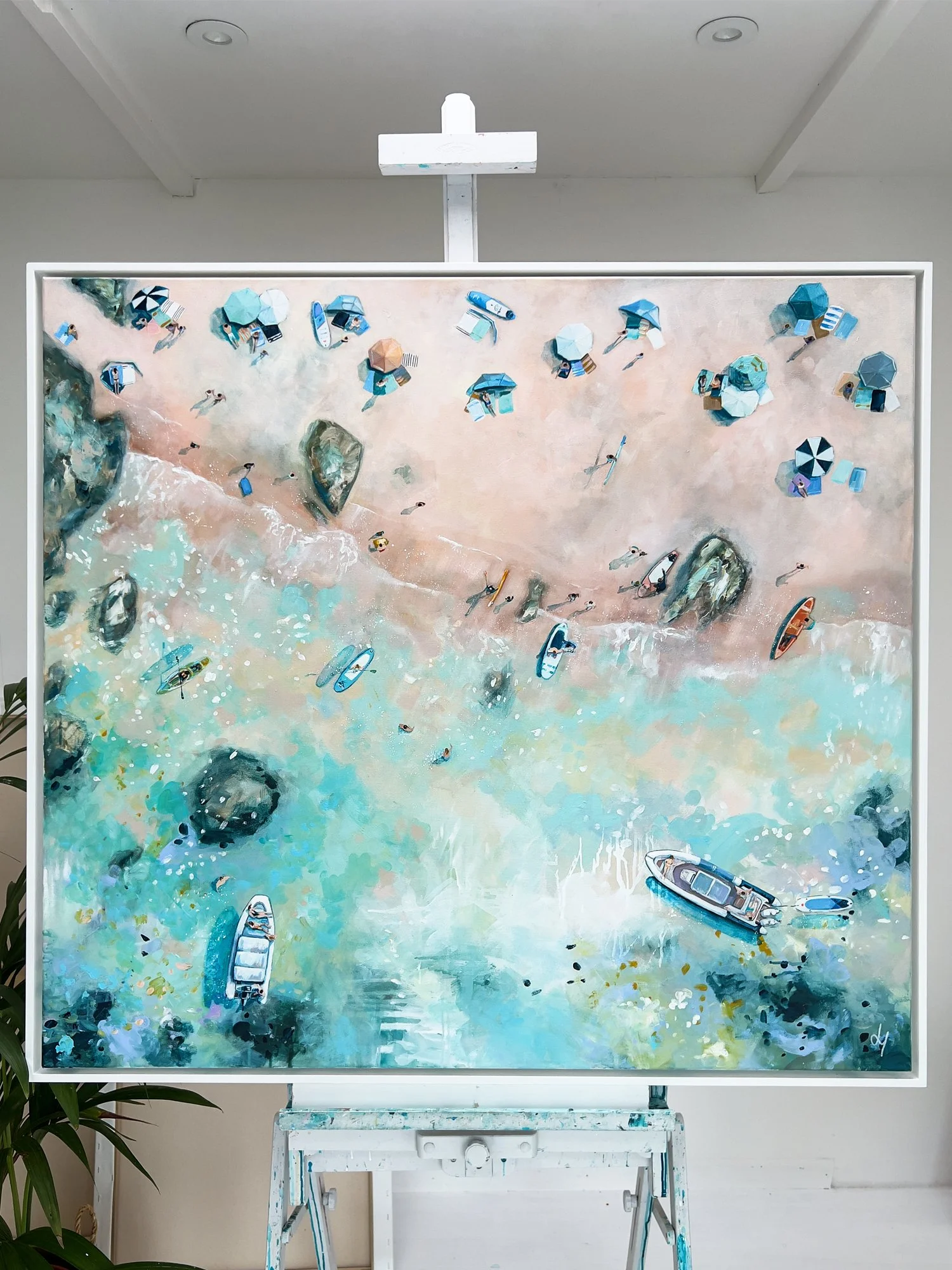 Large original aerial acrylic painting 'From Land to Sea' by Lucy Young. Features a crowded Sunny Cove beach in Salcombe with many boats and pastel-toned water.