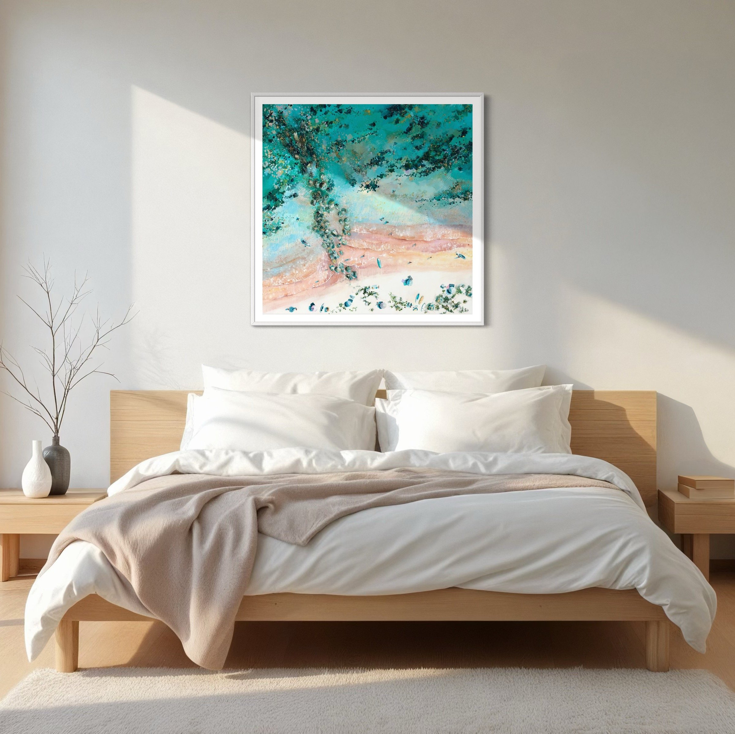 A framed Breakwaters print in a light filled modern bedroom, capturing the turquoise waters of the Bournemouth coastline