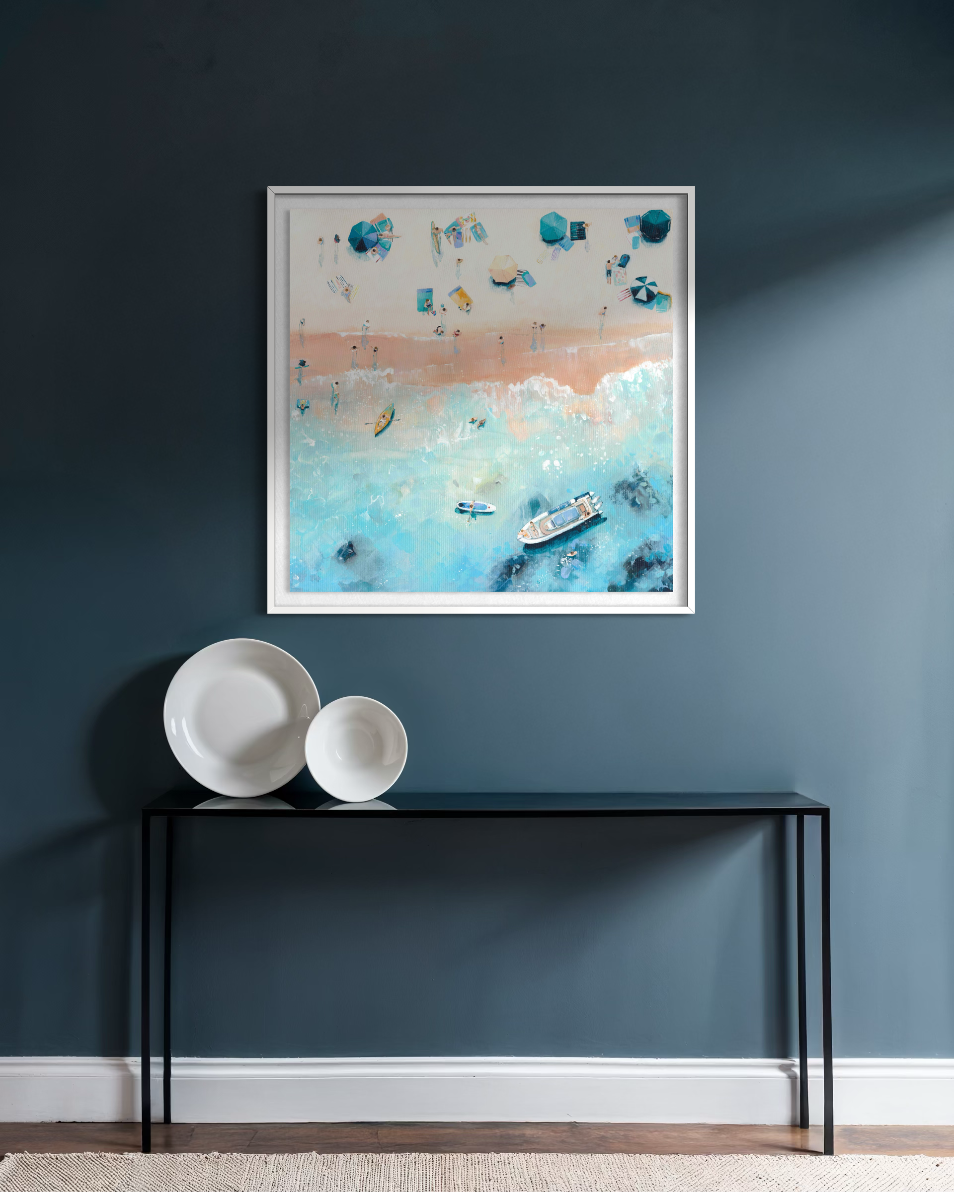 a framed beach days II print styled on a blue hallway wall, creating a bright and joyful focal point.