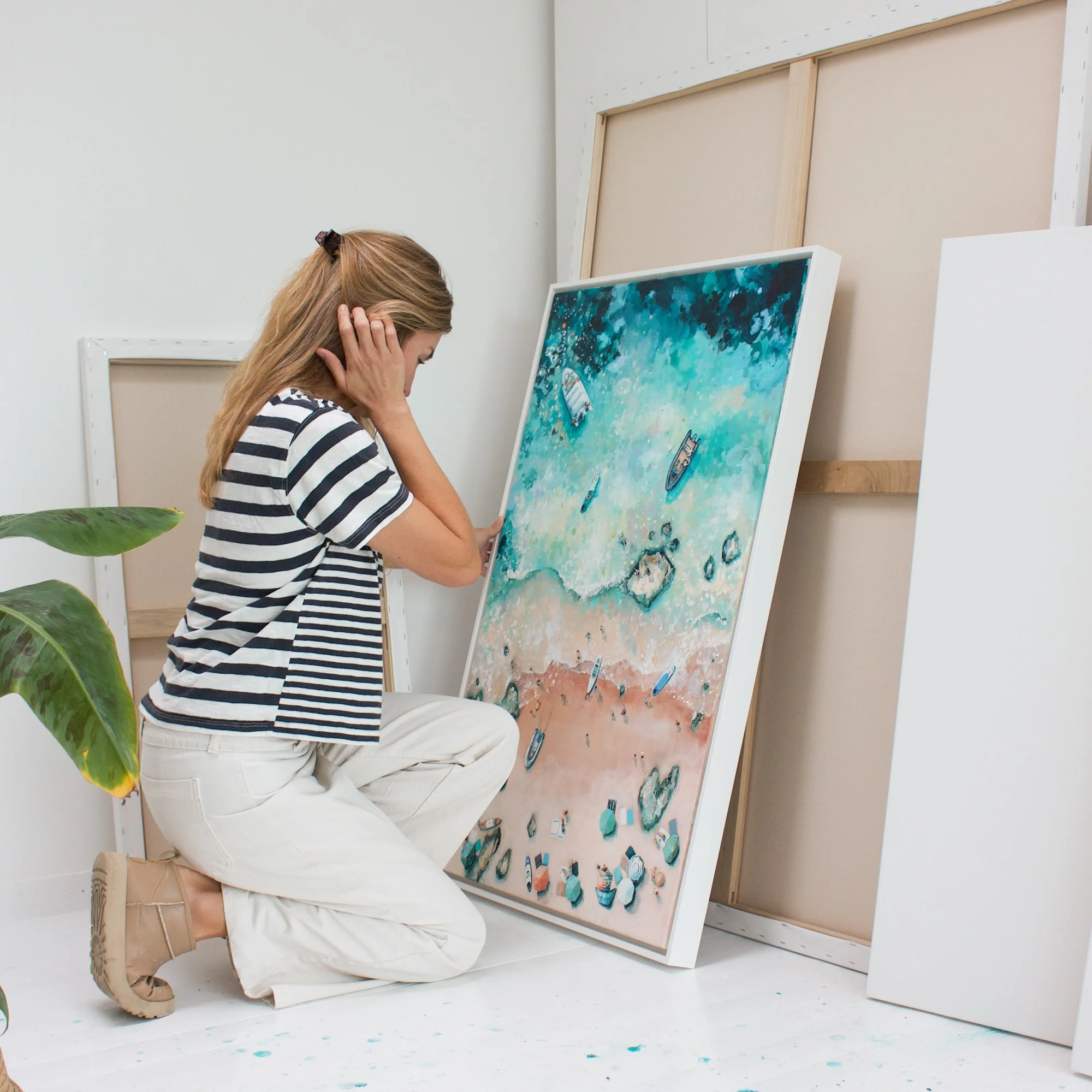 Large original aerial acrylic painting 'Beach Landing' by Lucy Young. Features boats landing on the golden sands of Sunny Cove, Salcombe, with vibrant turquoise estuary water.