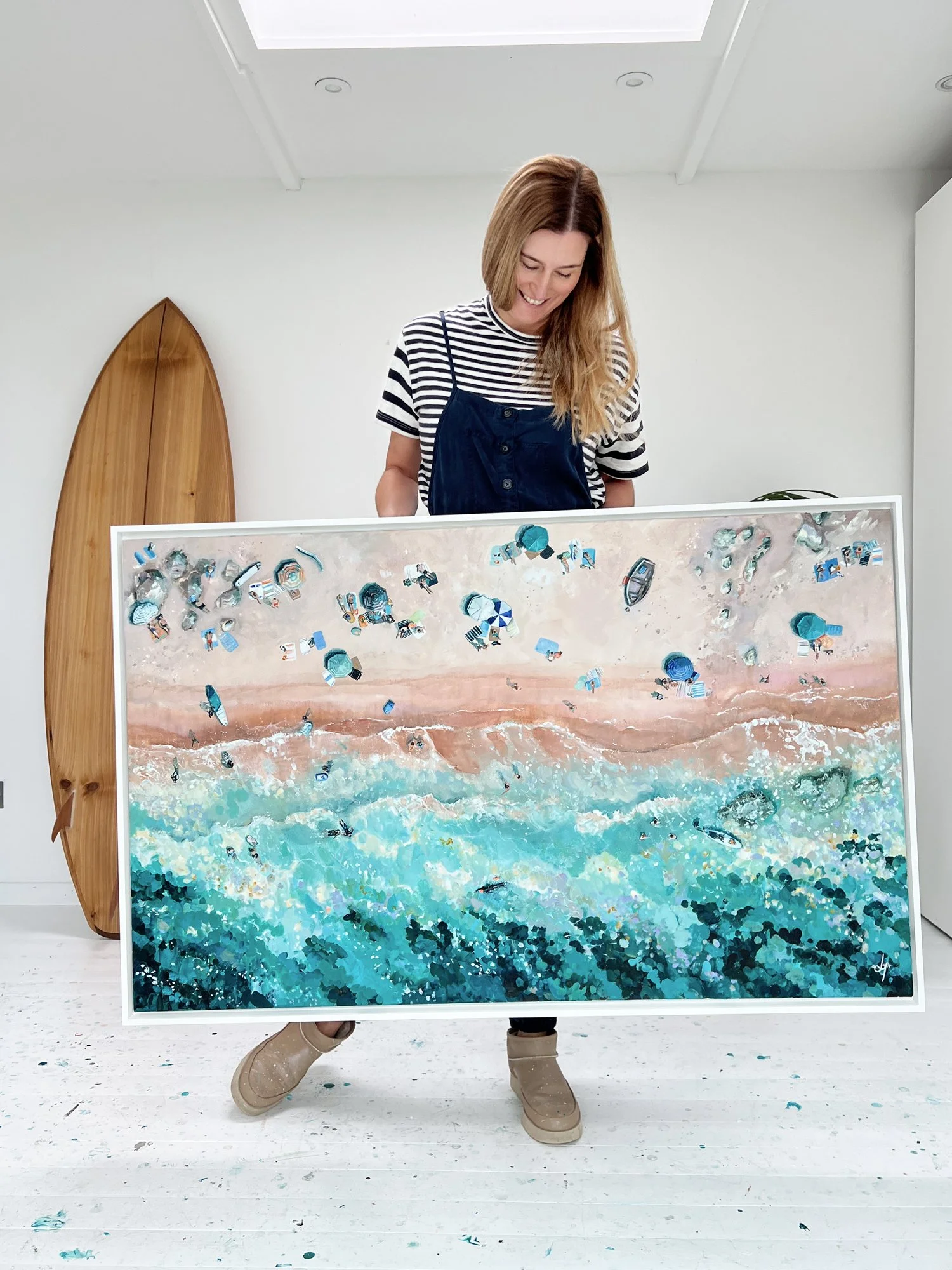 Large original acrylic painting of Hive Beach, Burton Bradstock by Lucy Young. Featuring sun-worshippers on the Dorset coast and a traditional wooden fishing boat with lobster pots.