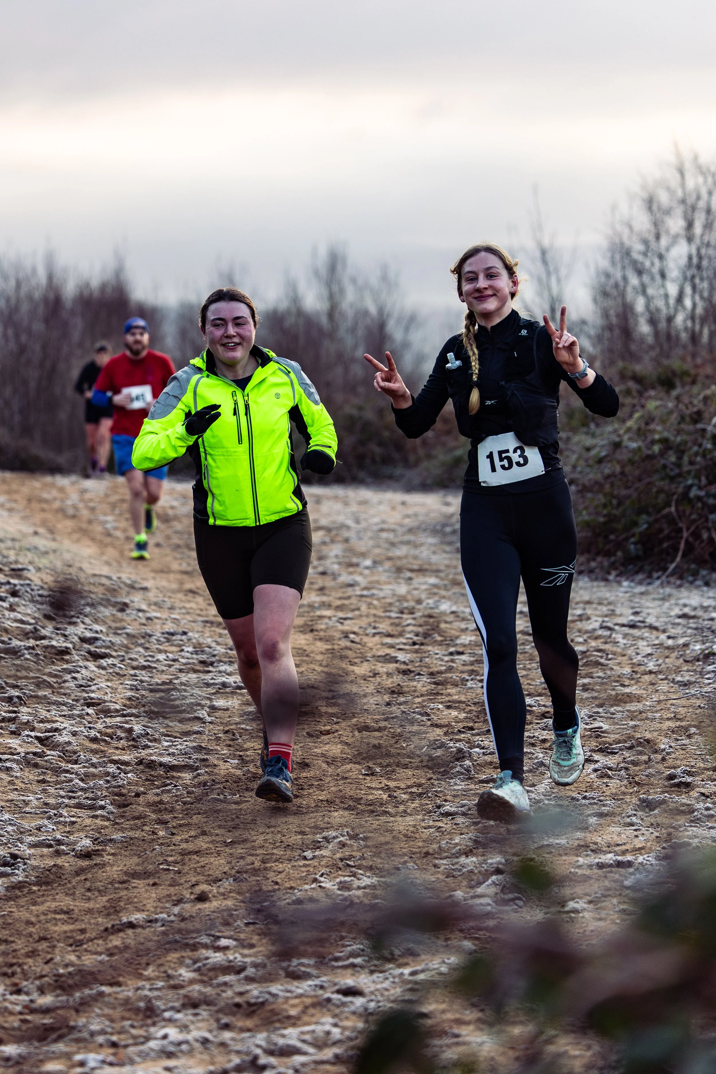 girls running in countryside