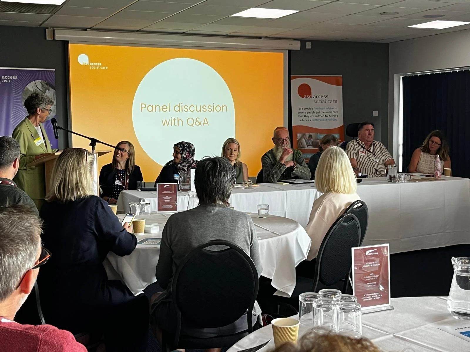 A group of people on a panel discussion chaired by partner organisation Barnwood Trust.