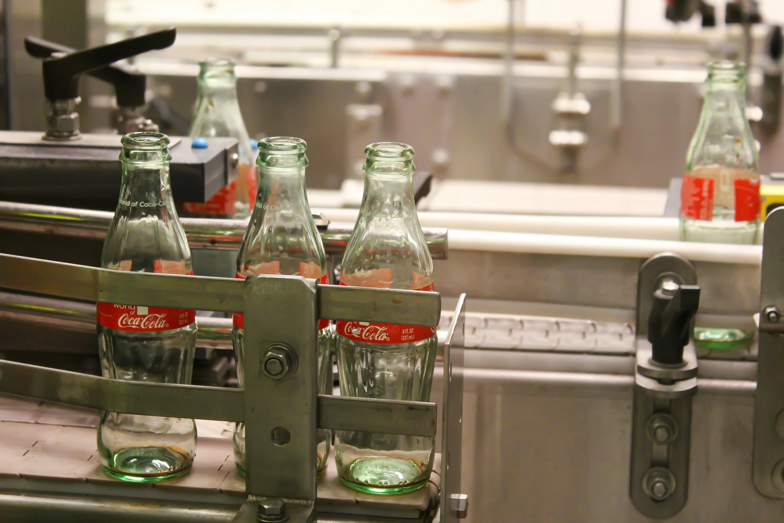 glass bottles on a conveyer belt