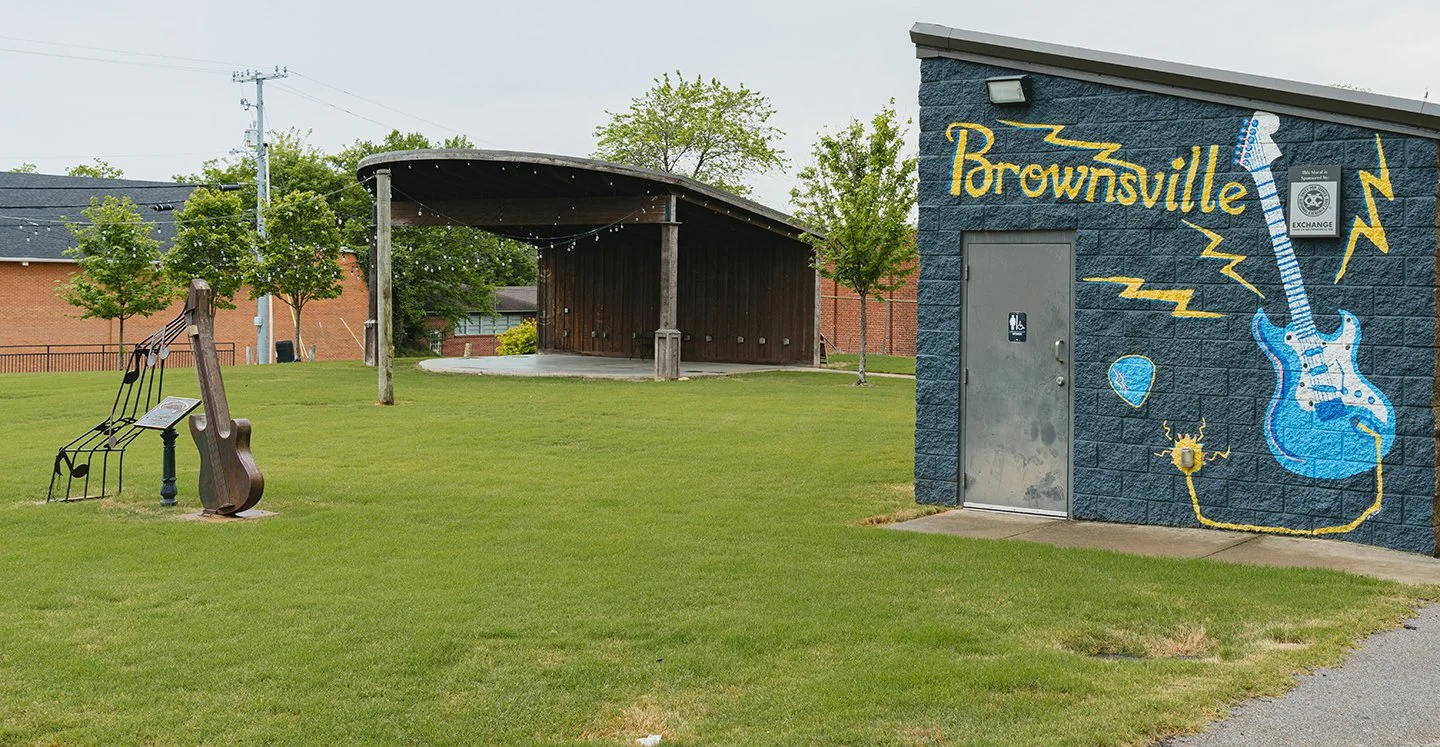 A guitar mural and metal Guitar Art is the showpiece of the Brownsville Amphitheater.