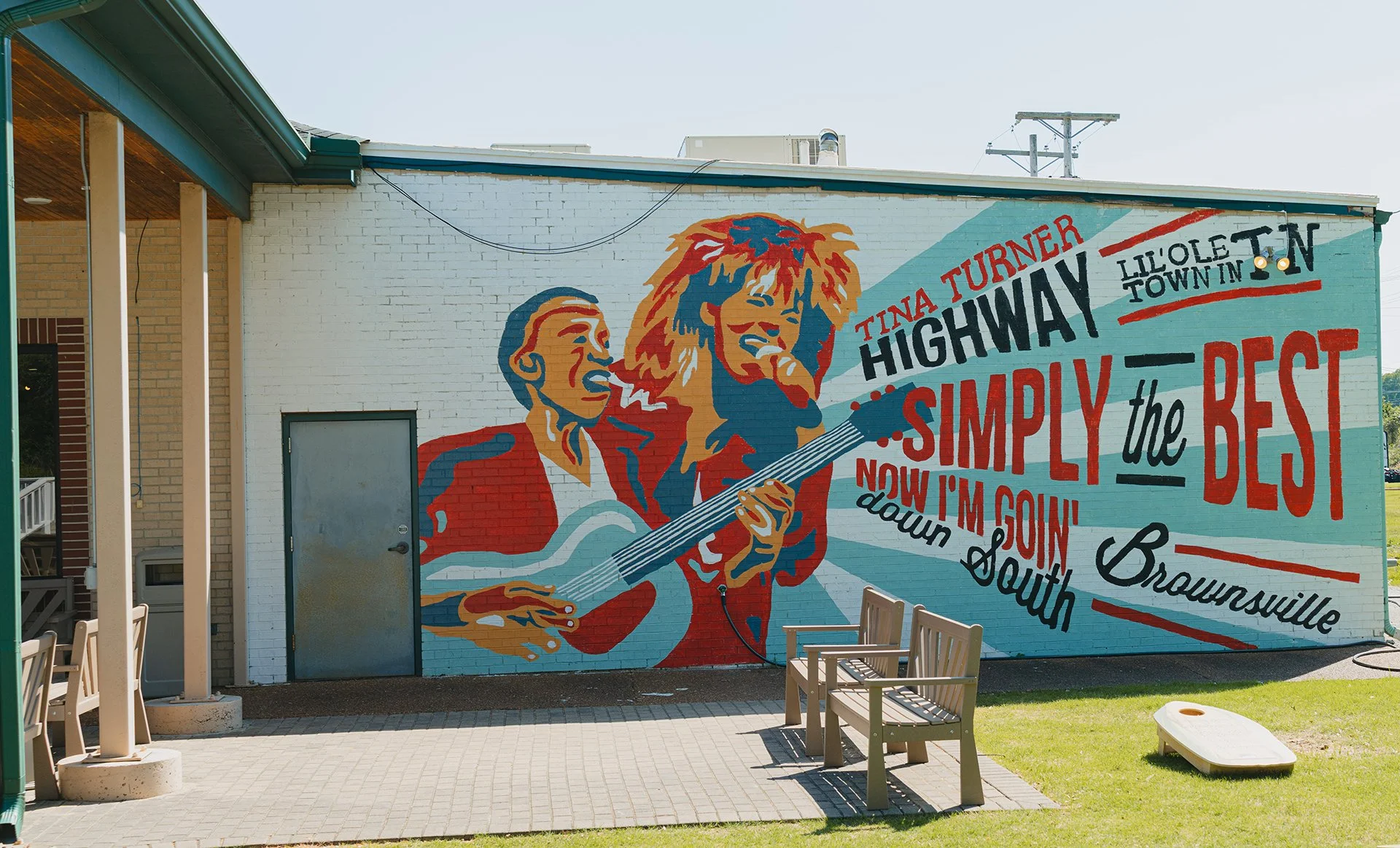 Colorful mural of Sleepy John Estes and Tina Turner at the West Tennessee Delta Heritage Center in Brownsville, Tennessee.