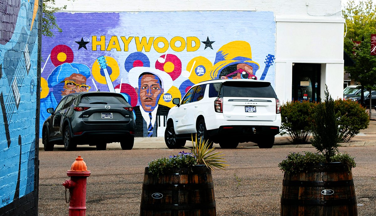 The mural of Brownsville's three bluesmen cover the wall adjacent to Uptown Alley on South Washington in Brownsville TN.