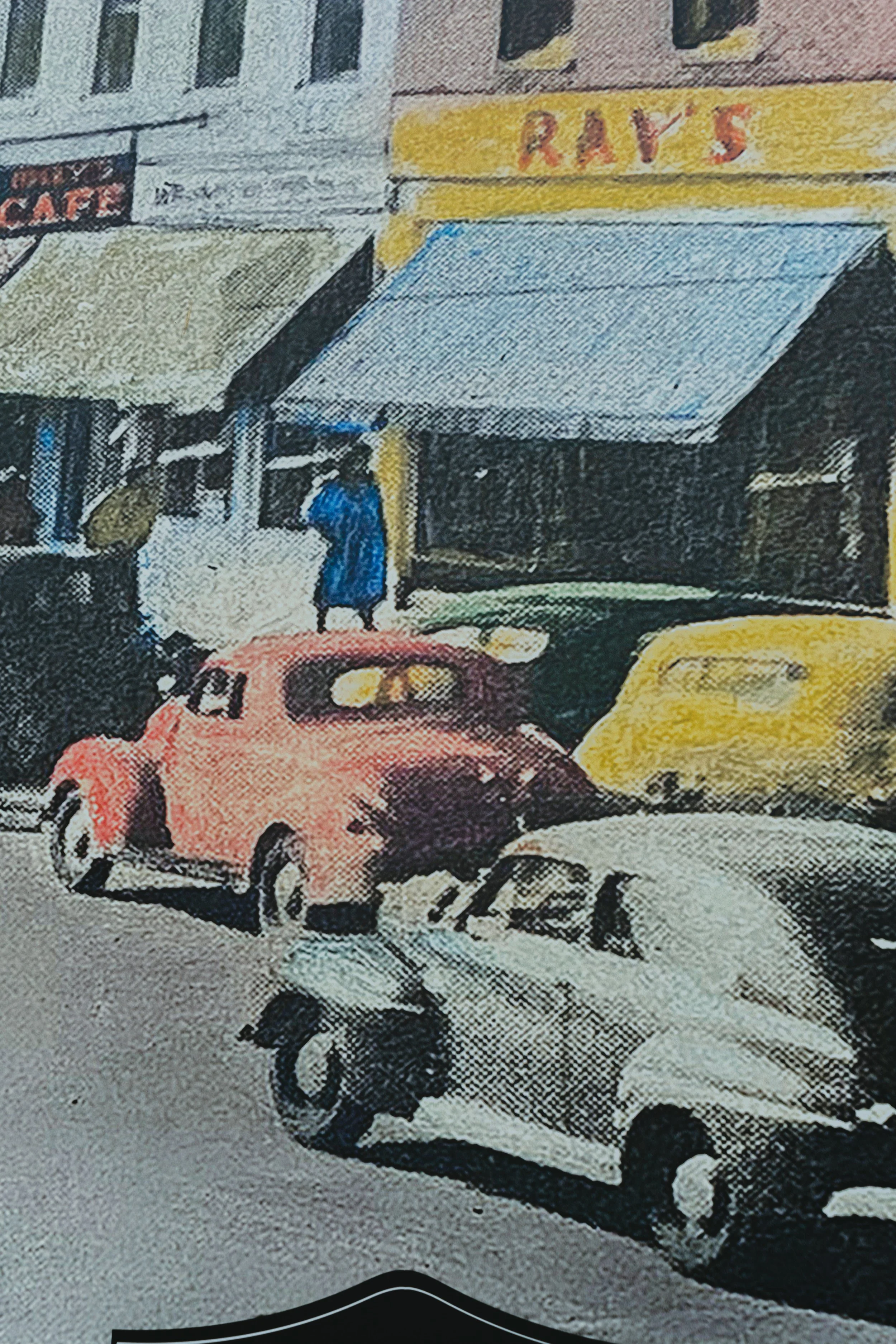 An old photo mural of downtown in the 1950s-1960s