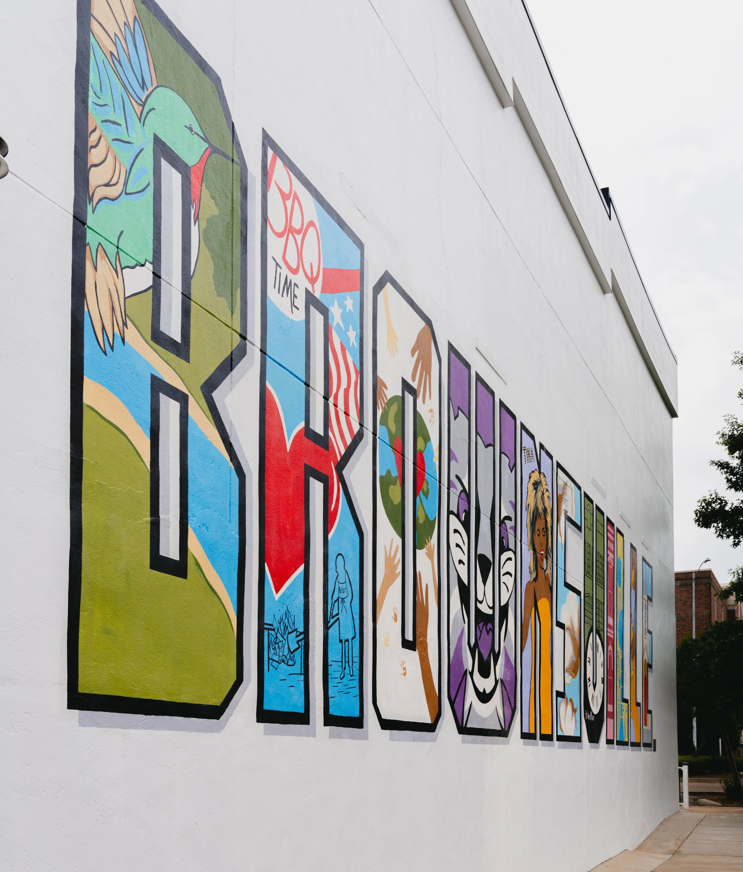 The bright and colorful Brownsville mural reveals a part of our history, culture and community spirit in every letter.