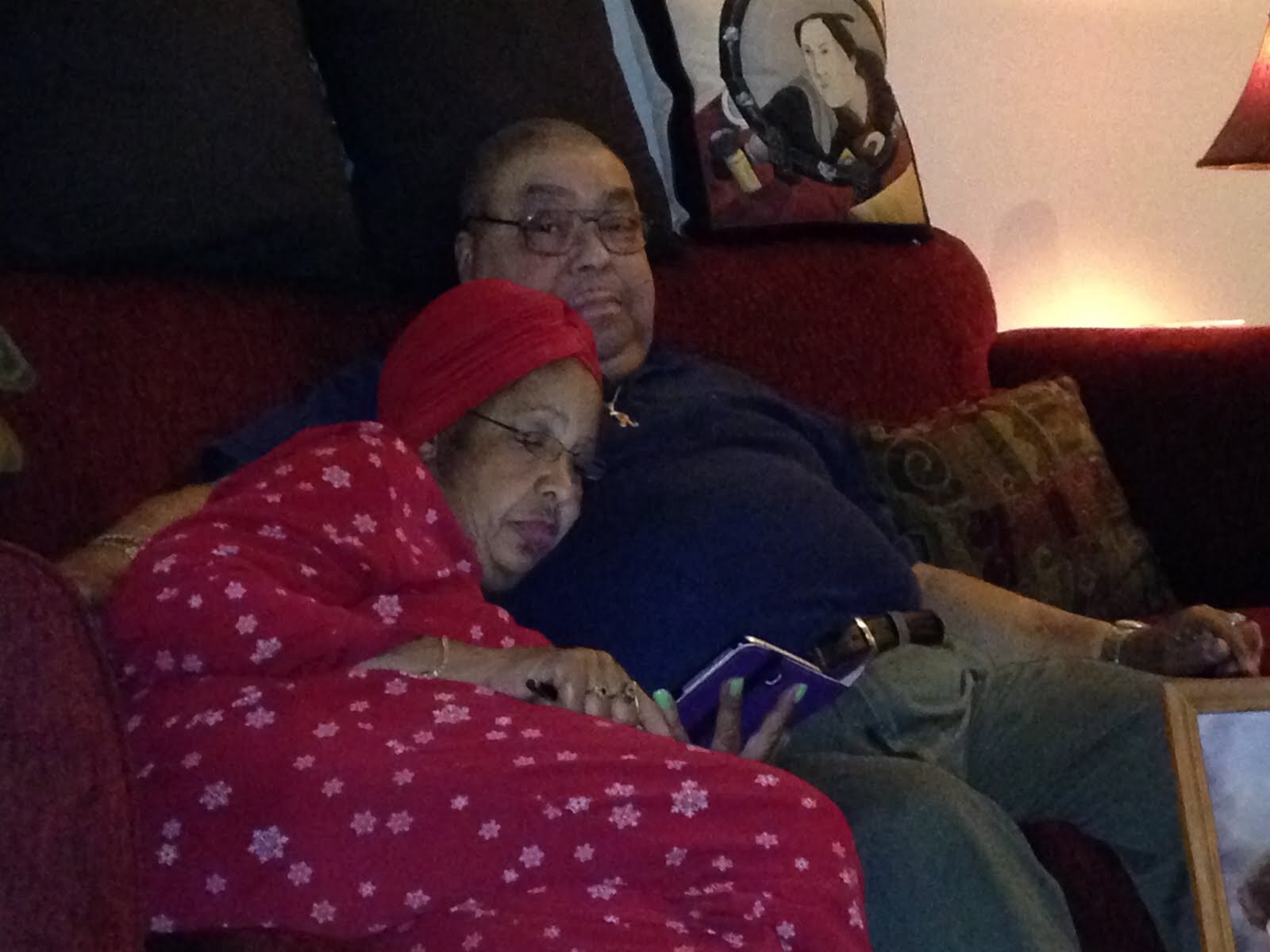 mom and dad couch snuggles.JPG