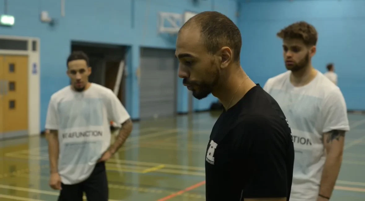 Physiotherapist and strength and conditioning coach Bradley Roehrig coaching vertical jump drills for two basketball athletes