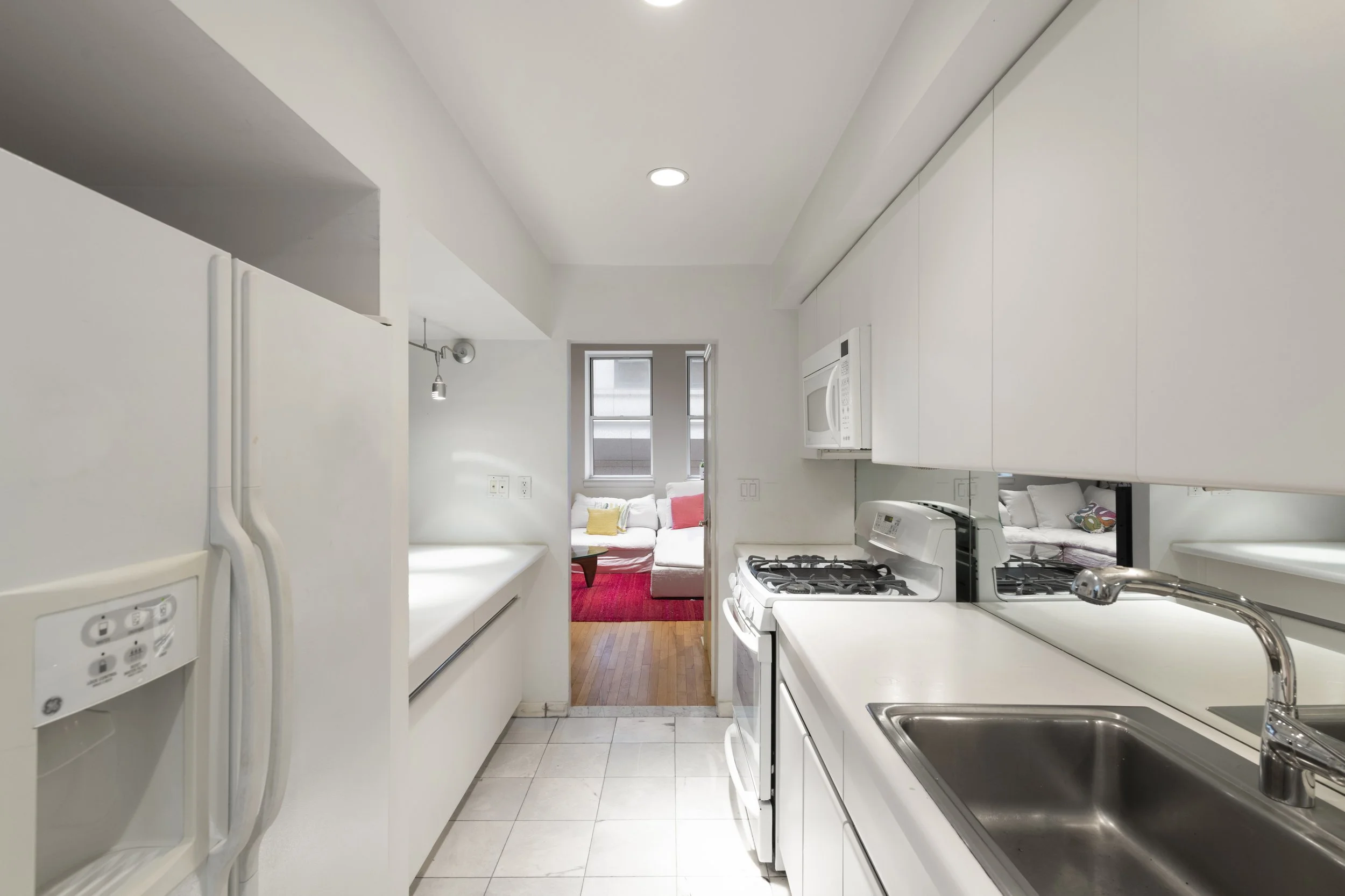 Roumila Real Estate — 54 Pine Street PH
