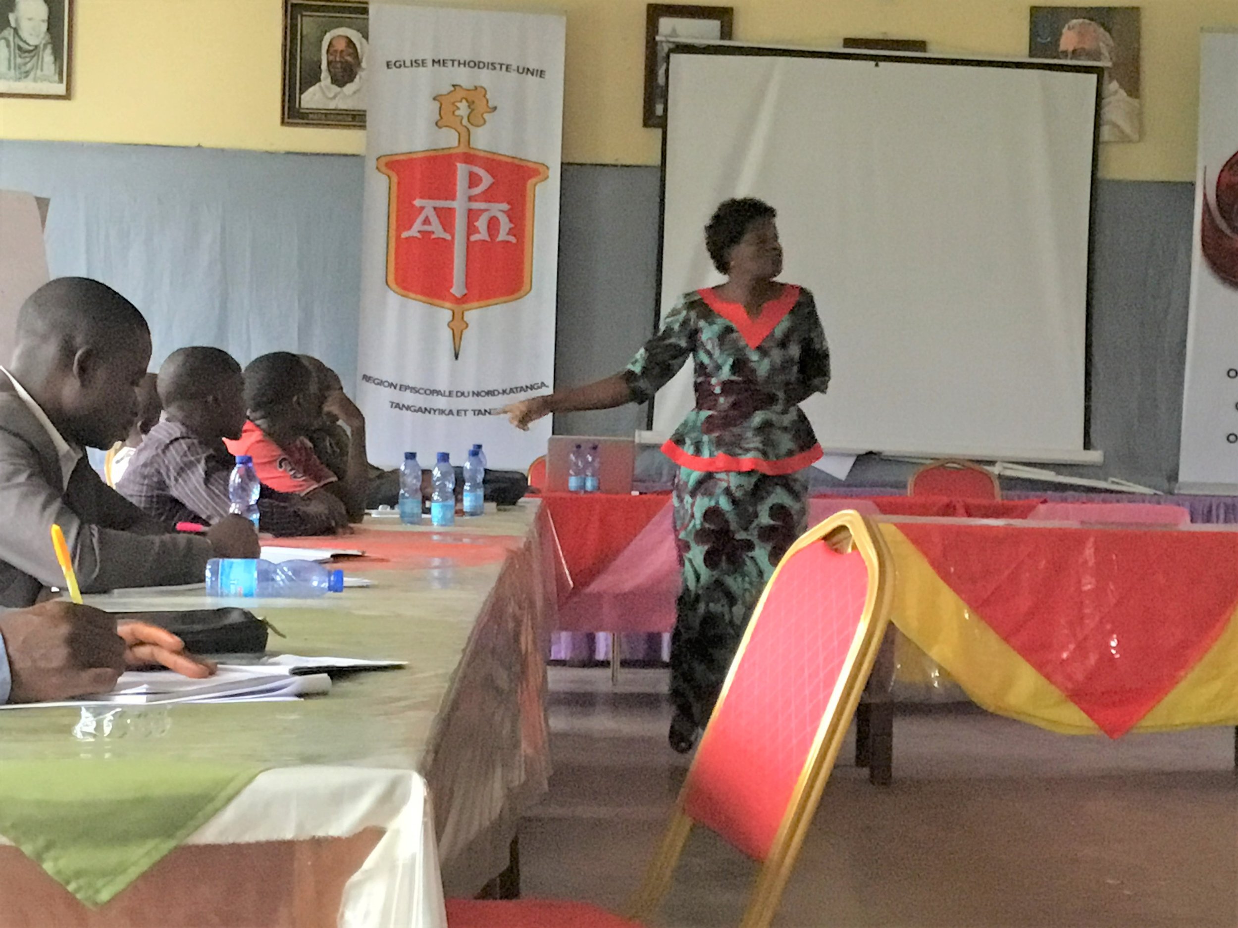 Dr Betty Kazadi Musau presenting on violence against women dring conflict.jpeg