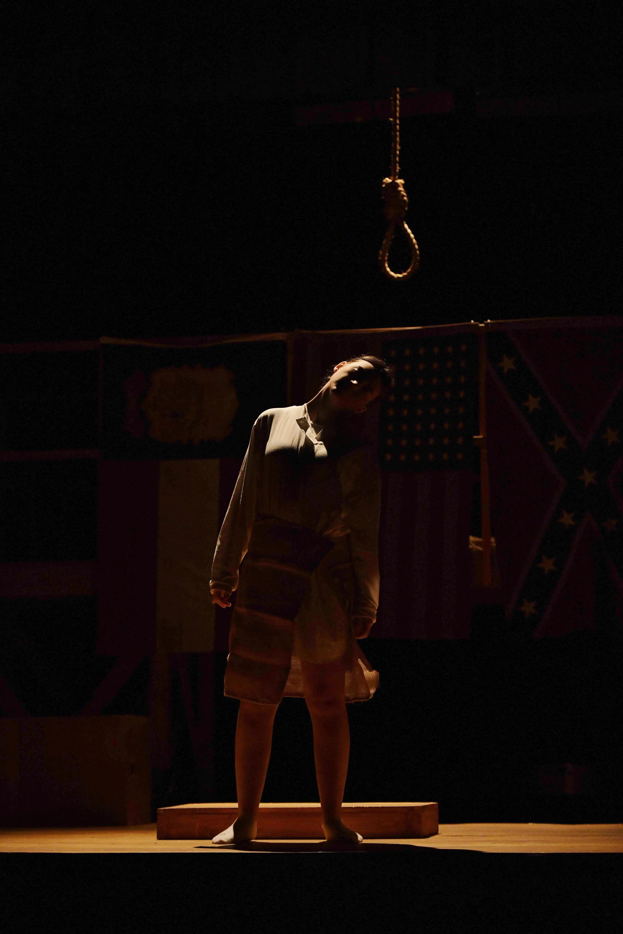 Parade, Smith Theatre, 2025 with shadow interpreters. Photo by Keith Tolman.