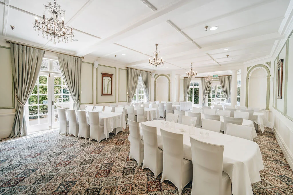 Russell Room  This majestic ground floor room opens to the veranda and garden through French doors. Ideal for formal dinners, wedding buffets or conferences.  Capacity: 90 Rental: $195.00 per 1/2 day (9am-5pm or 5pm - midnight). *Can include the snug and dance floor area.
