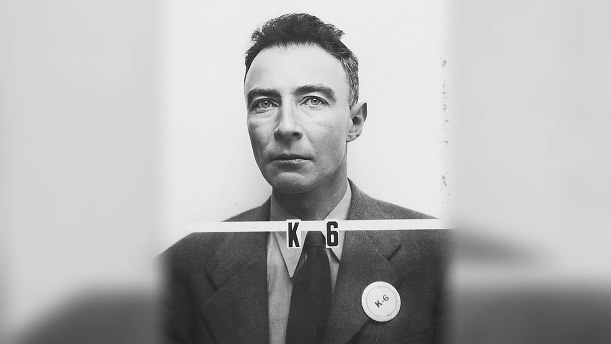 J. Robert Oppenheimer Los Alamos badge photo from the Manhattan Project era