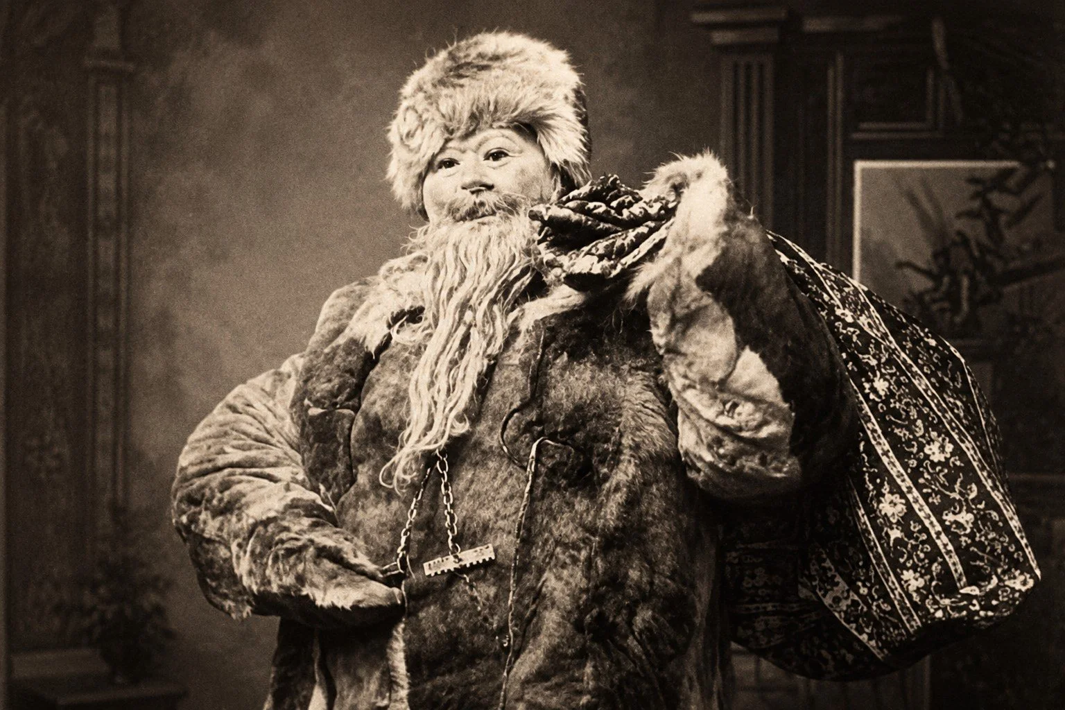 Vintage photograph of a fur-clad Santa Claus figure carrying a patterned sack, evoking the darker folklore of Christmas.