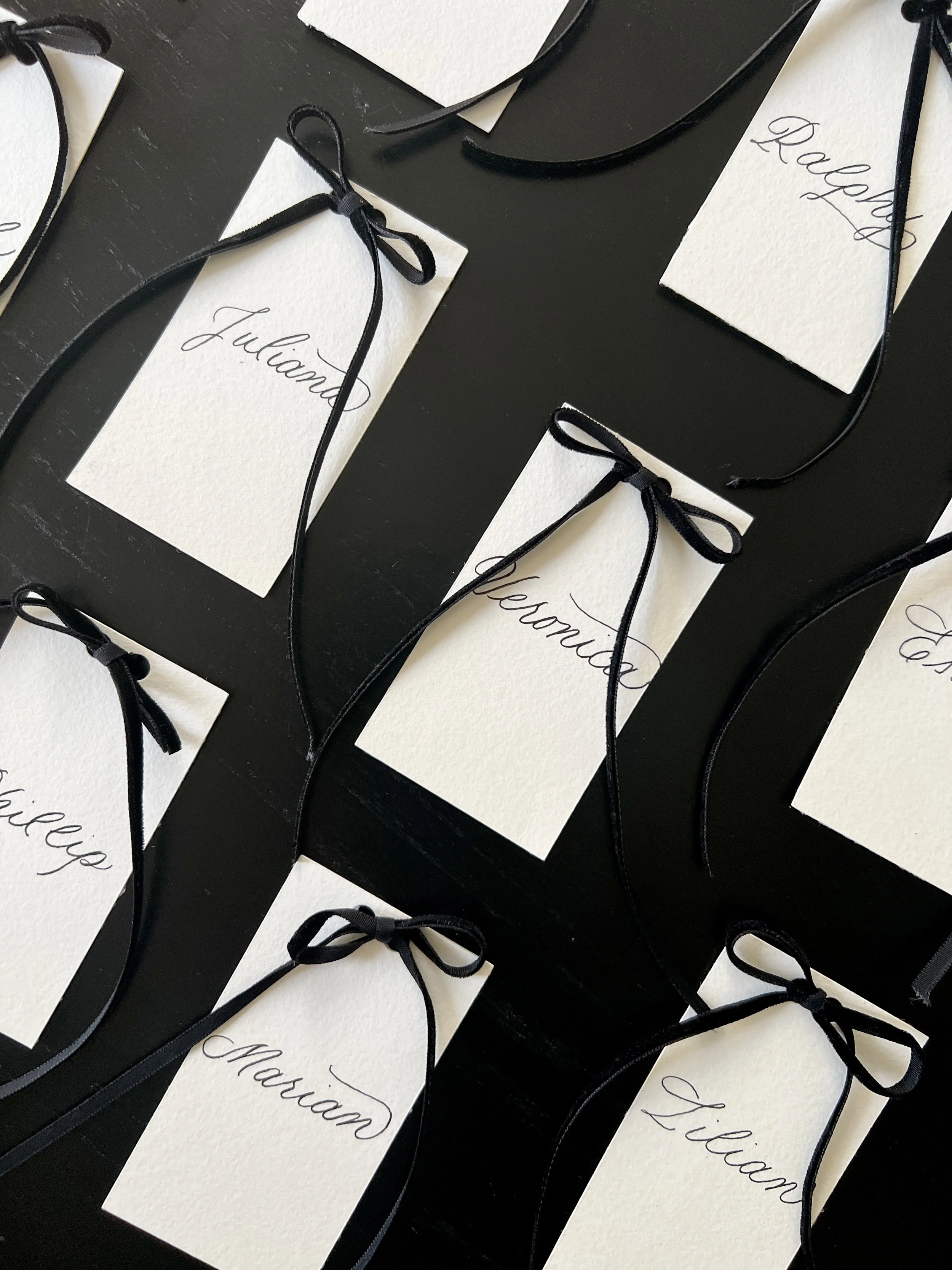 pennedbyk-custom-placecards-with-velvet-bow.jpeg