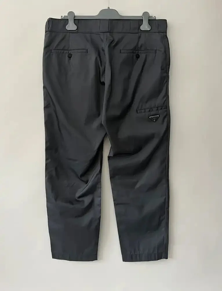 パンツ PRADA GRISAILLE CROPPED TROUSERS Wool flannel cropped straight pants in grey - Prada | Mytheresa