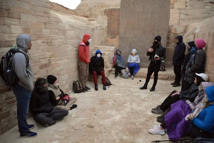 Between the paws of the Great Sphinx in 2022 with Russ Hudson