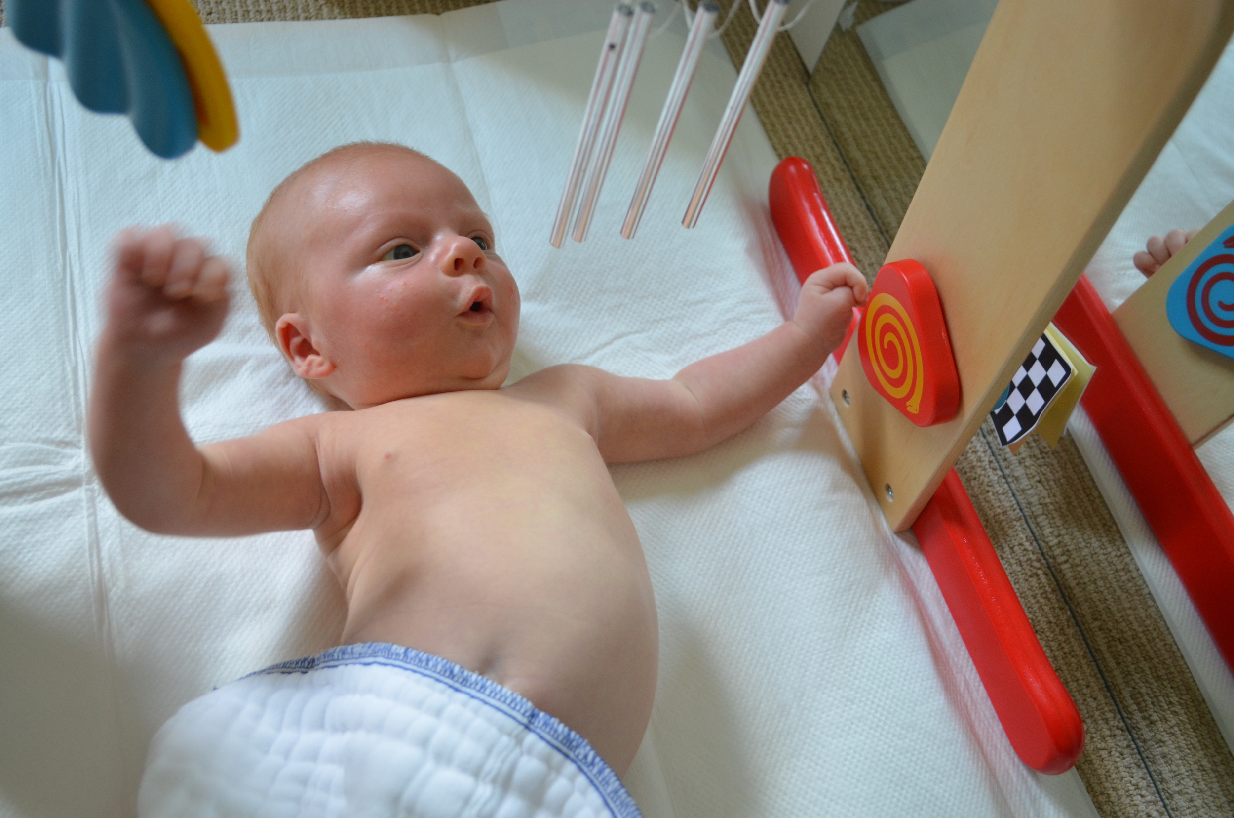 How to keep your baby's activity gym from making his head flat