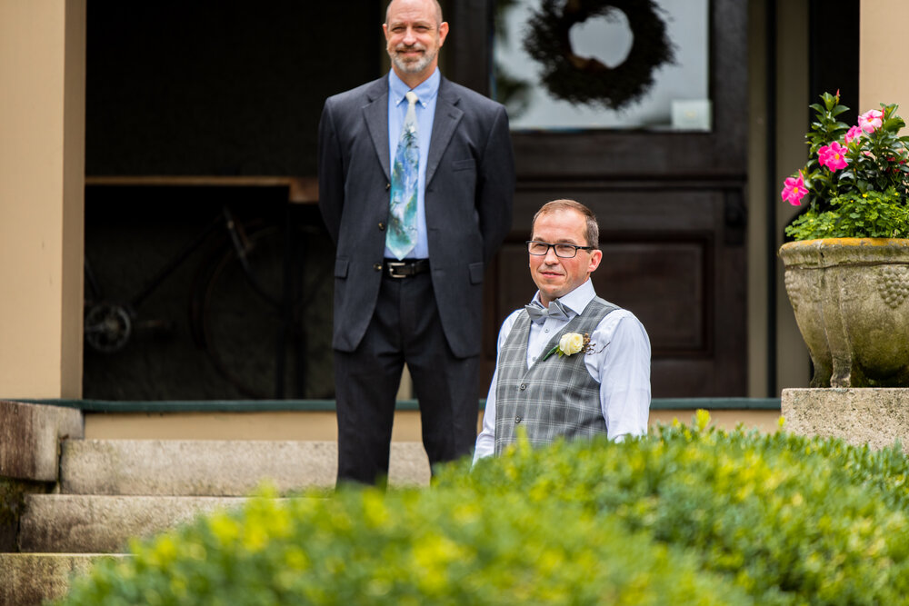 Groom and officiant waiting for the bride at the Inn on Montford