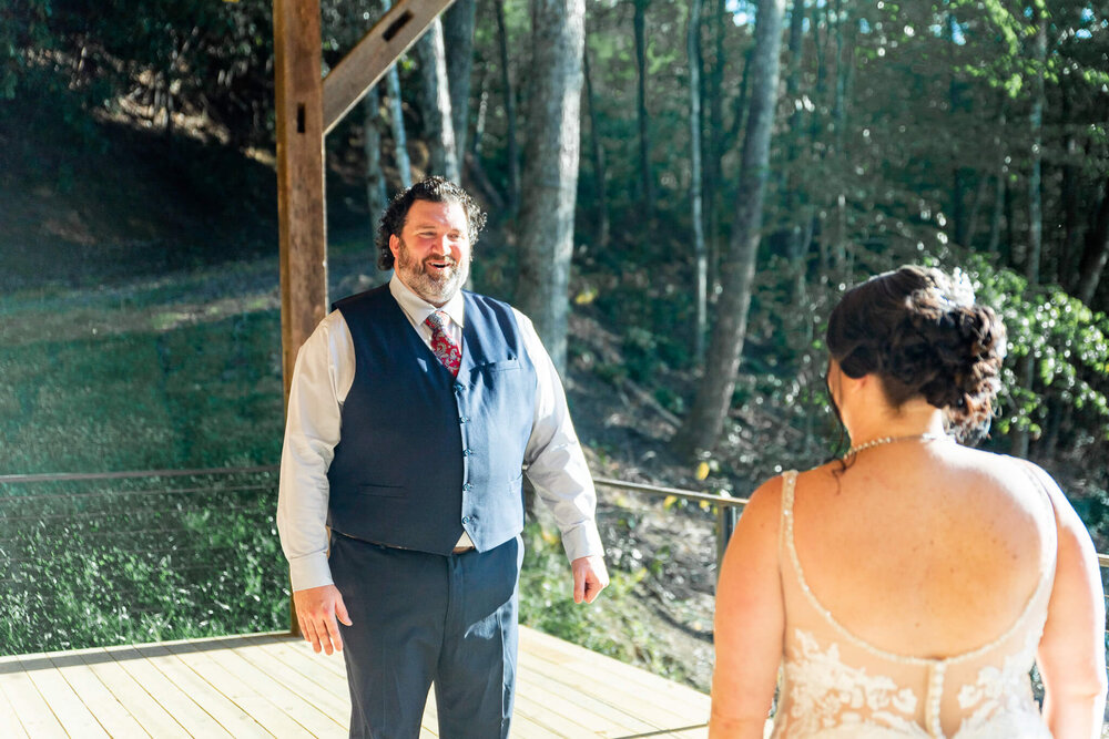 Groom seeing his bride for the first time at their first look taken by Nick Levine Photography