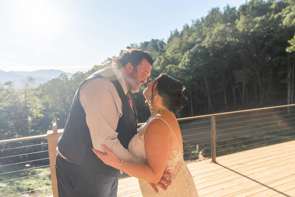 bride and groom after their first look at mountain wedding venue The Parker Mill