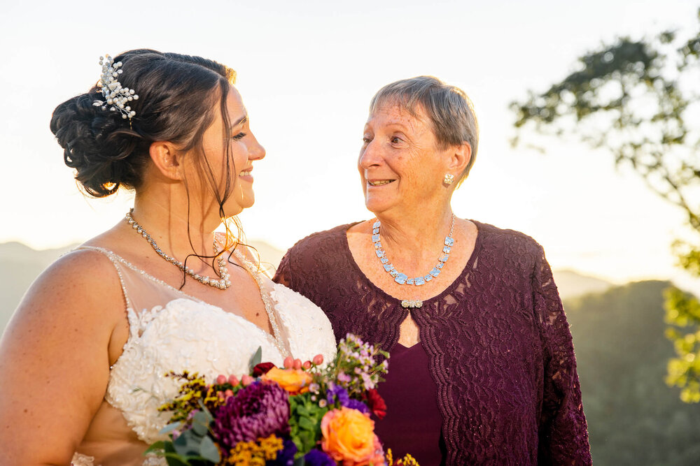 bride and her mother sharing a moment at their intimate elopement in the mountains photographed by Nick Levine Photography