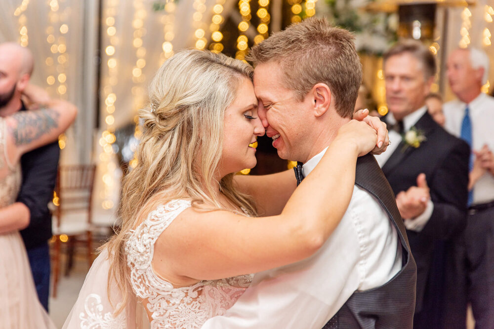 bride and groom during their greenville sc wedding venue reception space