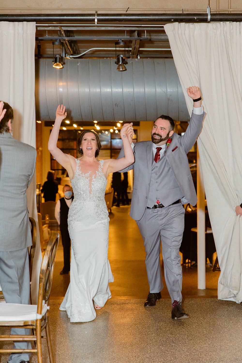 bride and groom entrance for their asheville wedding reception photographed by nick levine photography