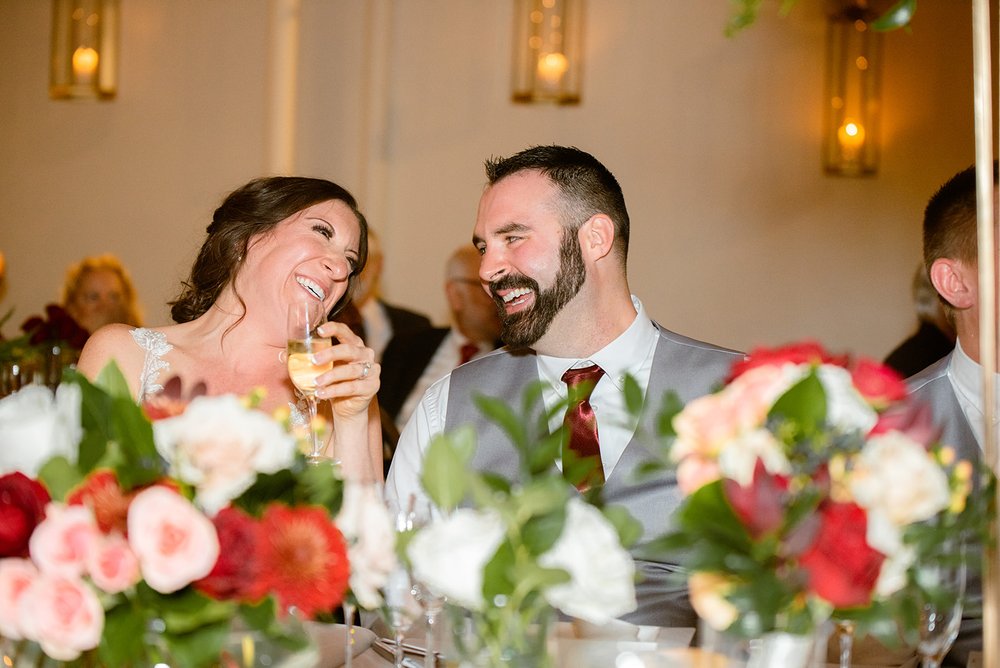 bride and groom laughing during speeches photographed by local photographer nick levine photography