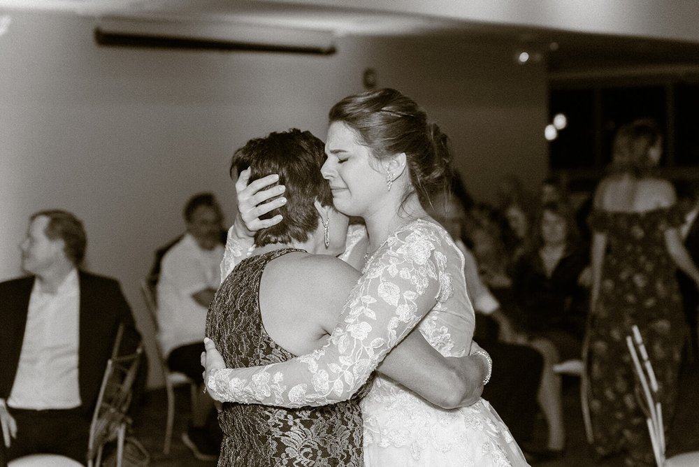 mother and daughter crying during wedding dance at the capital club of asheville