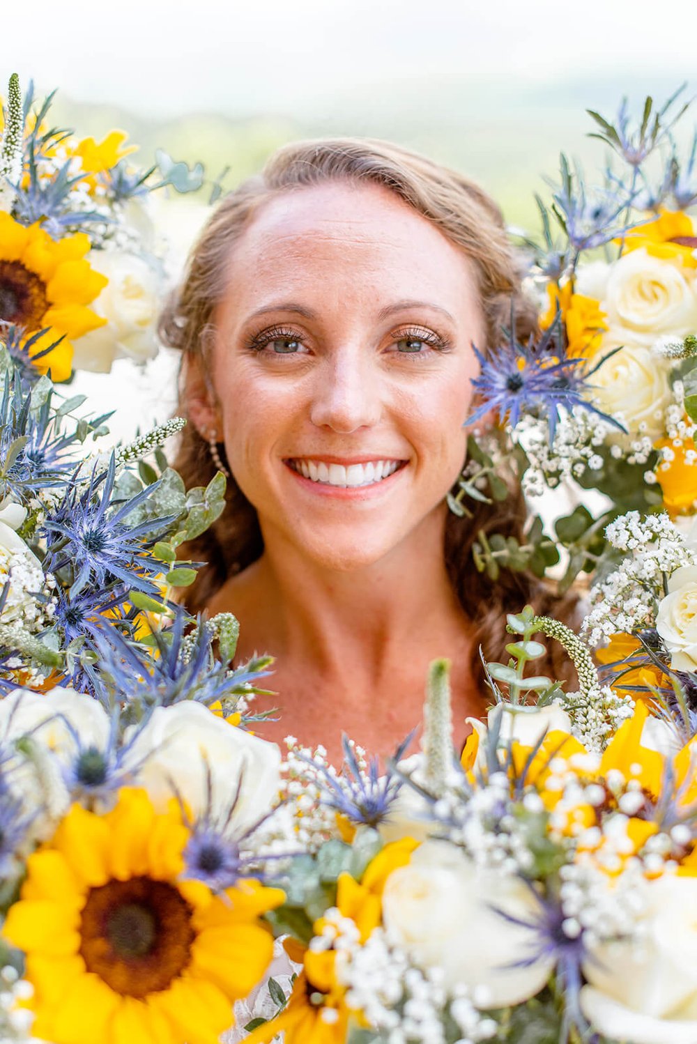 bridal portrait with flower bouquets by asheville photographer nick levine