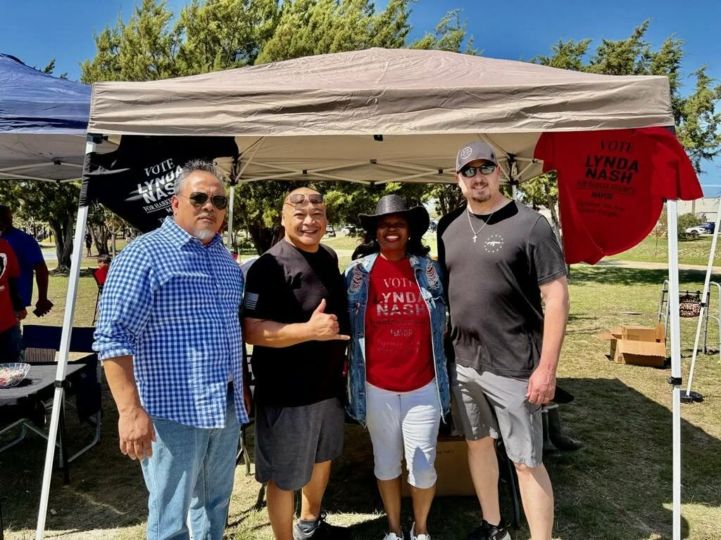 Herker Heights Councilwoman Lynda Nash poses with volunteers and constituents in Carl Levin Park.