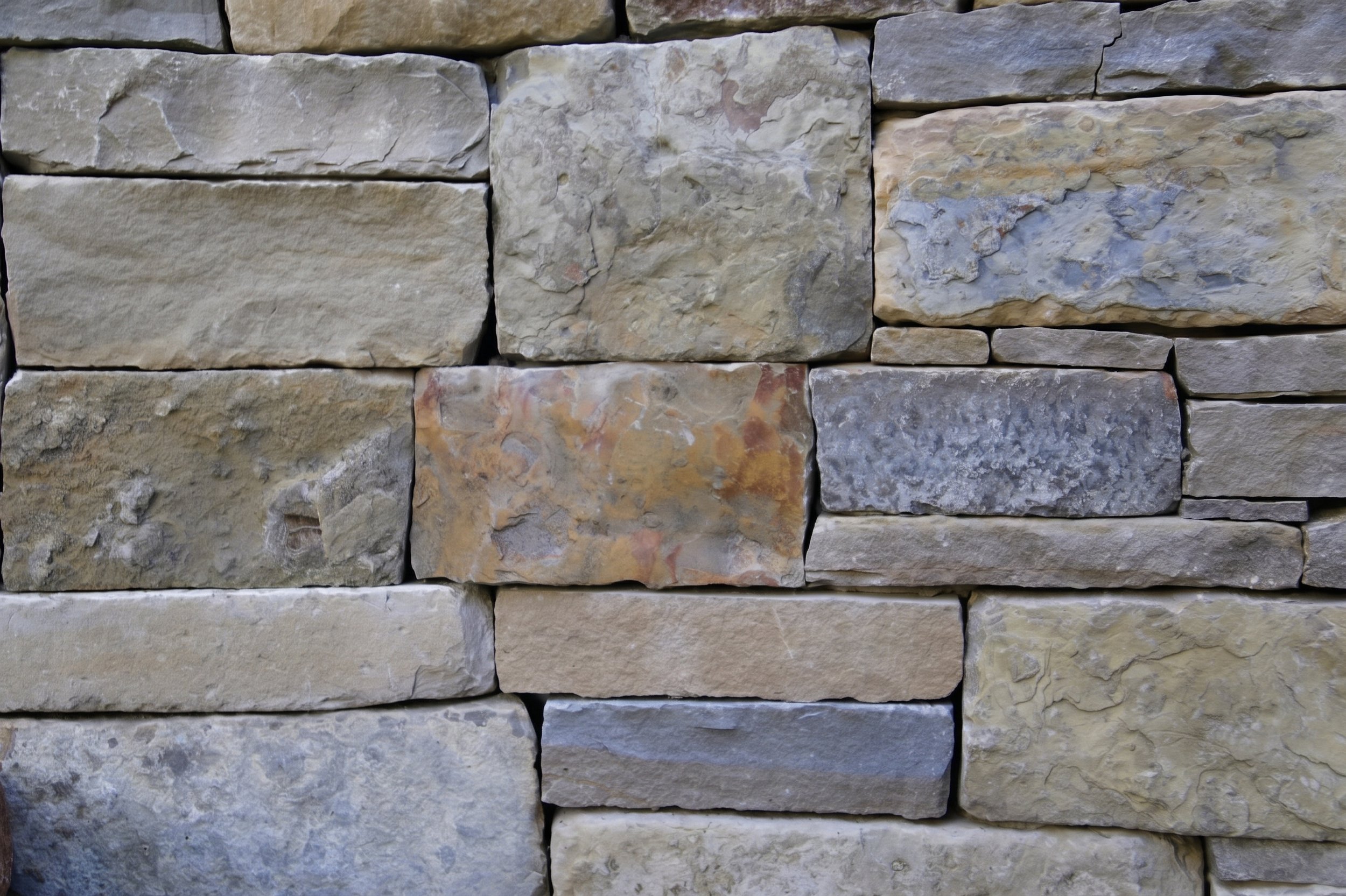 Dry-stacked stone wall.