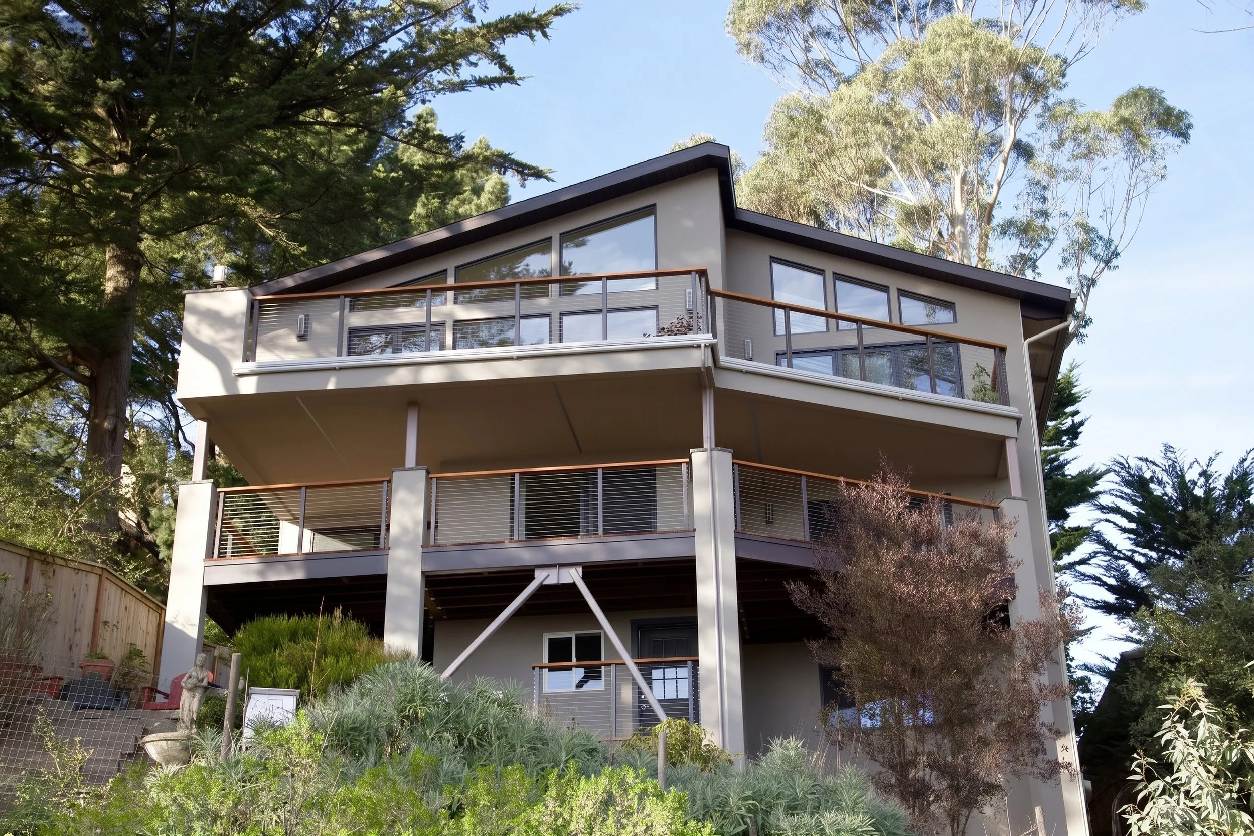 Hillside house in the Oakland Hills with new decks on two levels.