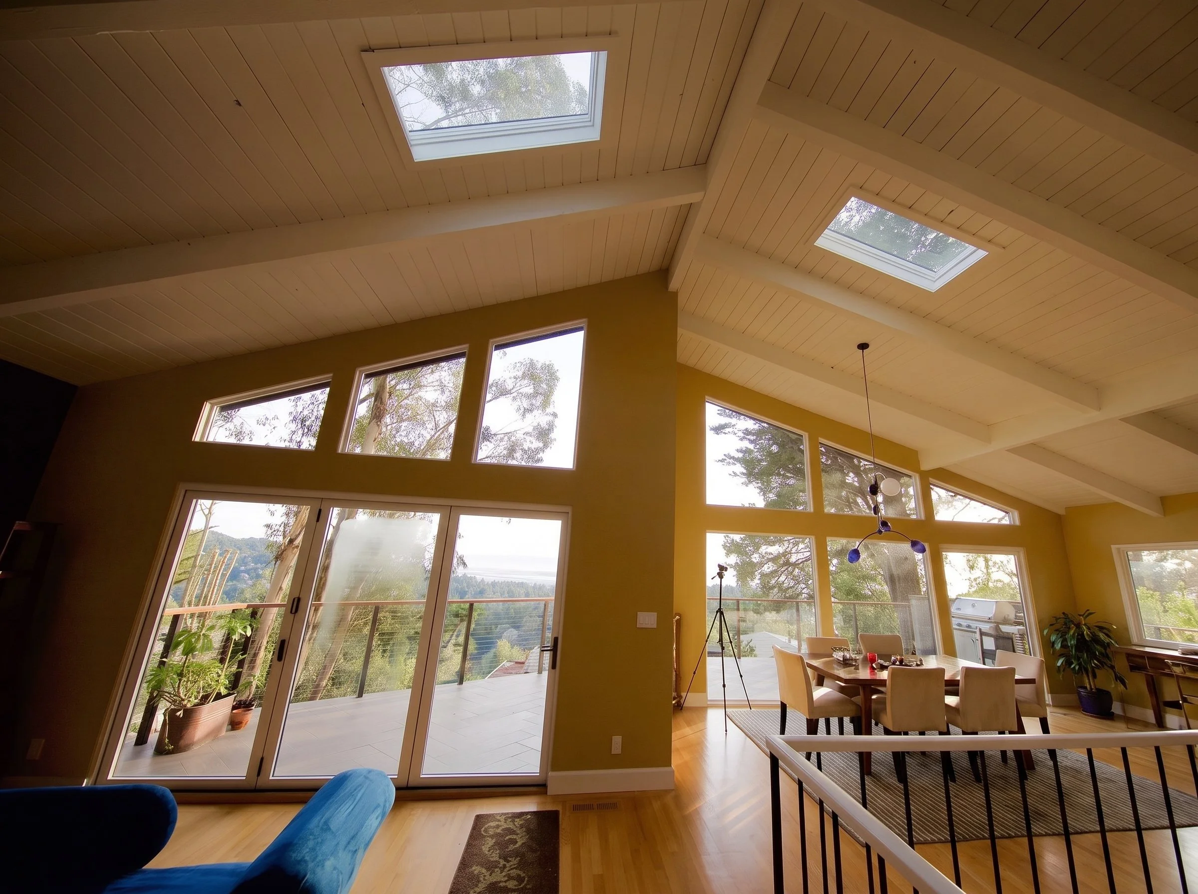 Interior of the addition with angled windows and skylights.
