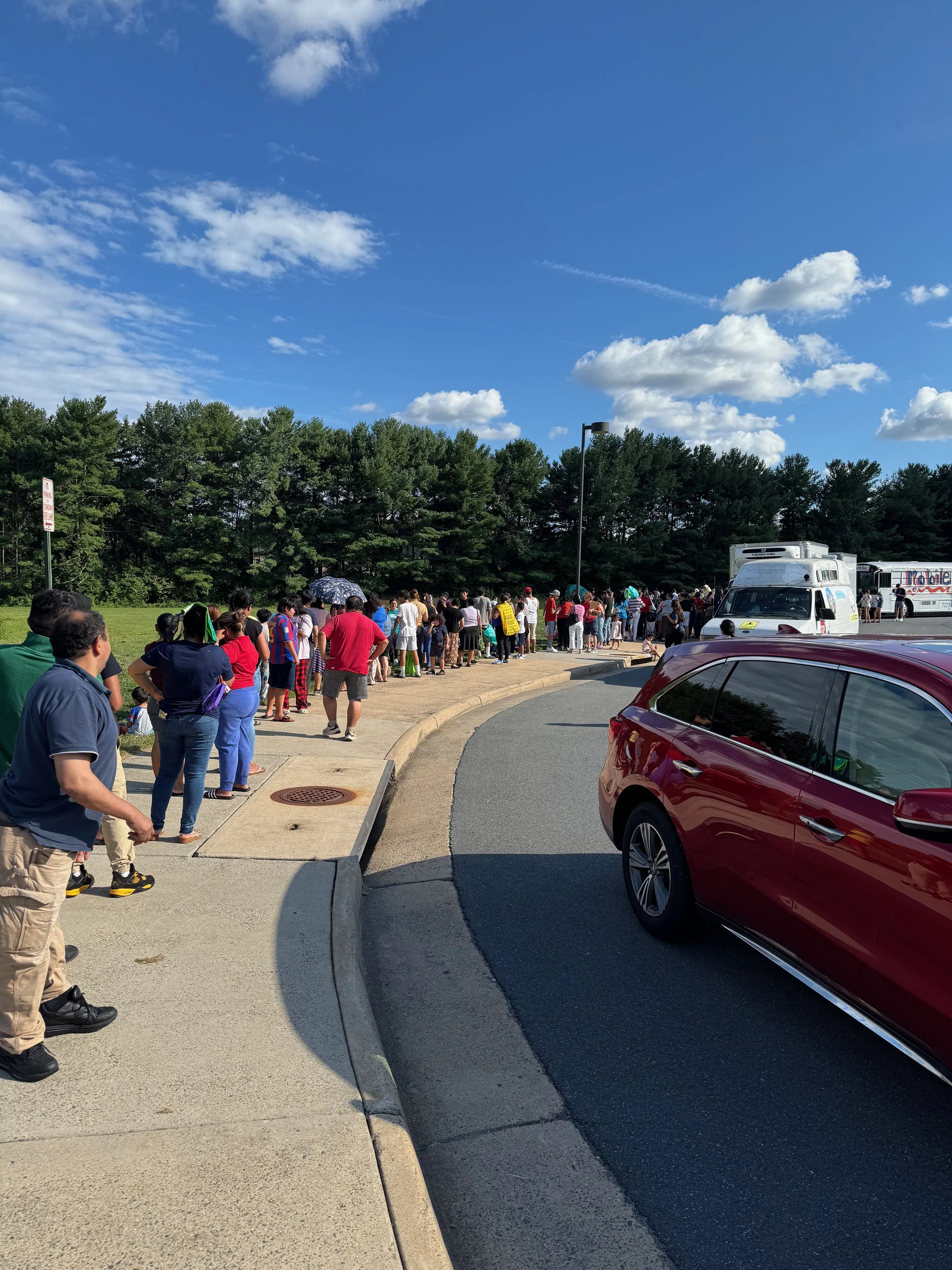 More than 100 families were waiting in line when we arrived at many of the stops.