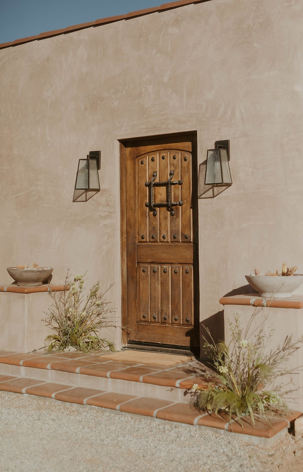 Joshua-Tree_Morada_estate_property_front-door_Spanish-Style_house_boho_wedding-venue.jpg